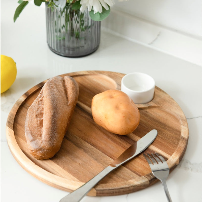 Round Wood Serving Tray with a Ceramic Bowl